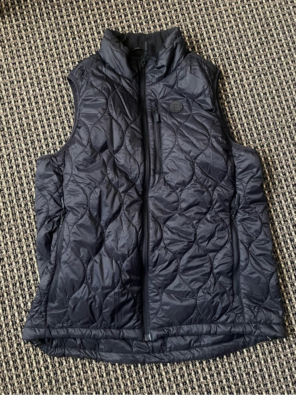 Black collapsible puffer vest